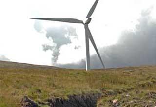 Wind turbine and drainage channel on hillside